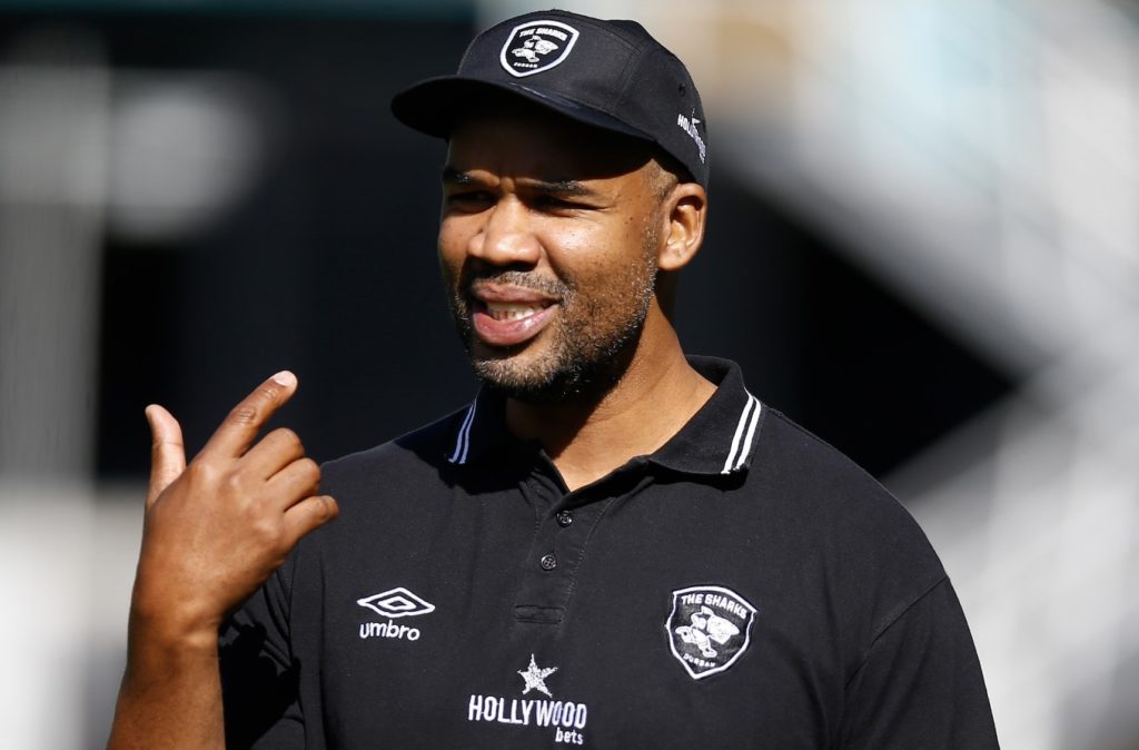 JP Pietersen in a black Sharks cap and polo